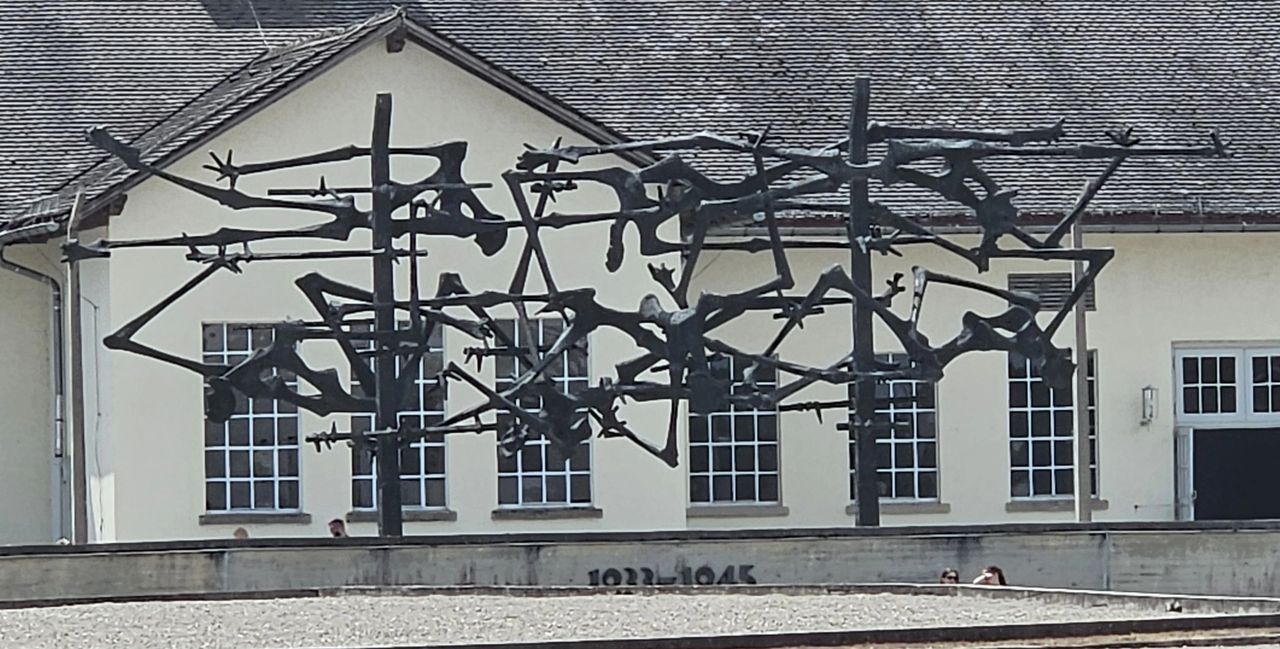 The memorial at Dachau. Humans caught in barbed wire. very powerful and thought provoking. 