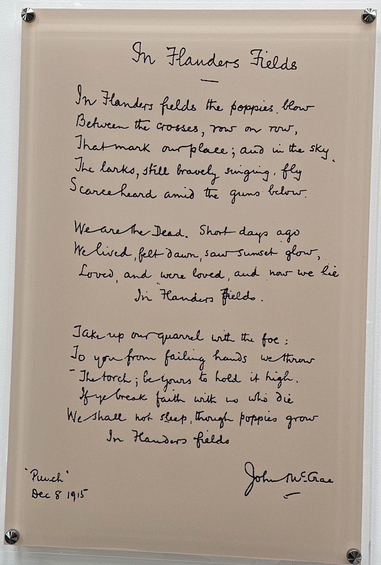 A copy of the original poem, "In Flanders Fields."