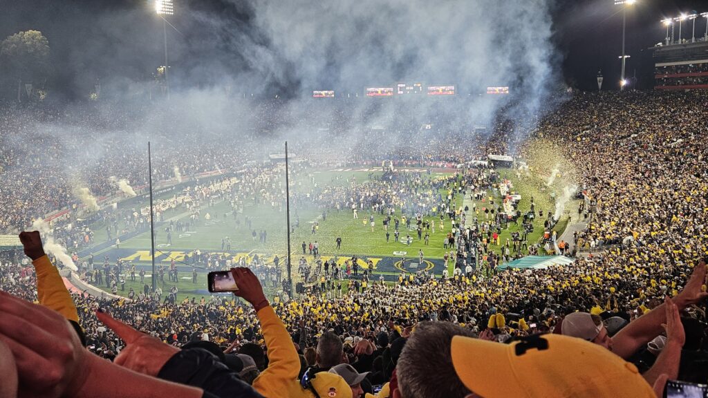 The crowd celebrates at the rose bowl after Michigan won. View from high up