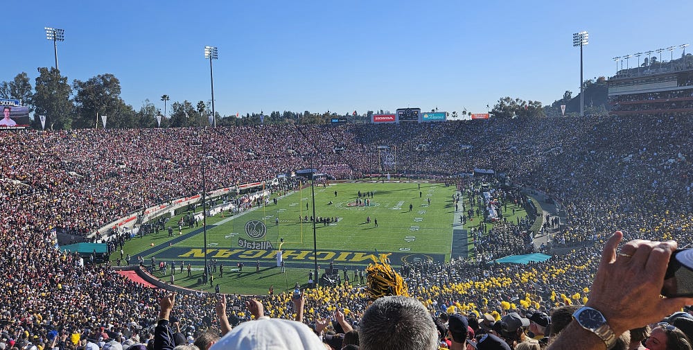 The magnificent Rose Bowl Stadium. Before kickoff, a sold out crowd. 