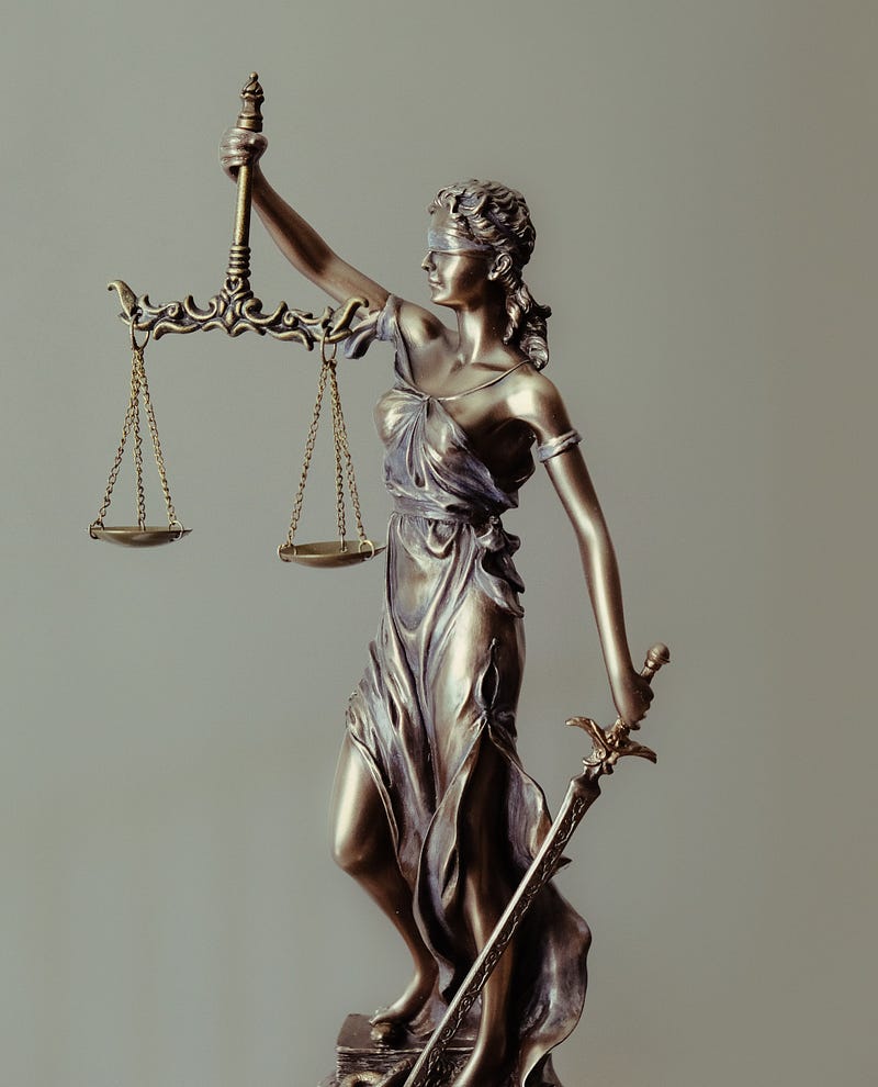 Lady justice with the scales of justice