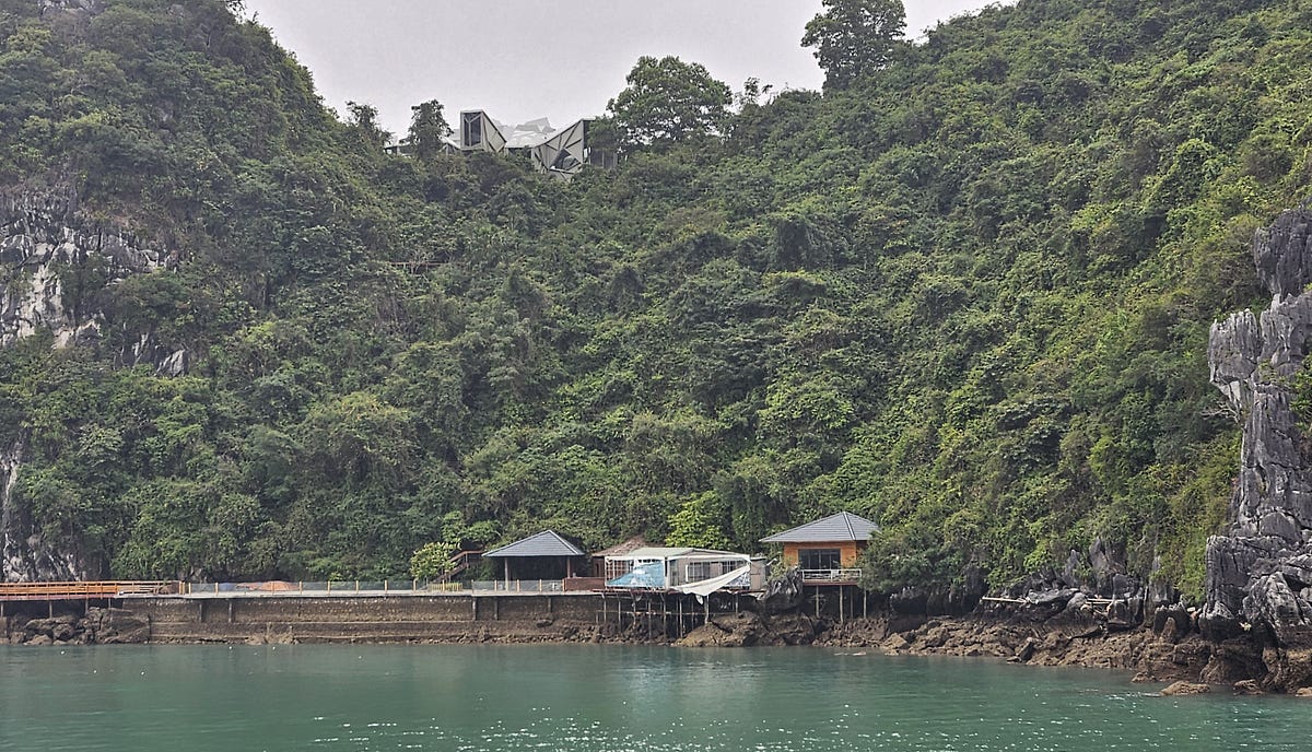 small houses with a large dock in ha long bay