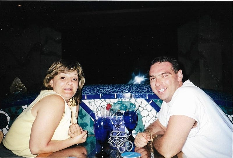 A man and woman having dinner in a restaurant