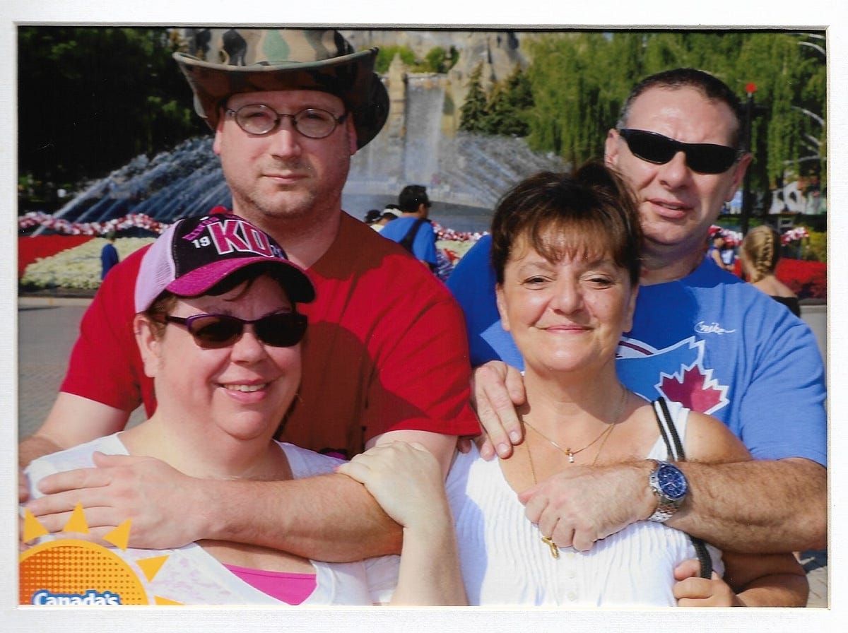 2 couples pose at Canada’s Wonderland theme park