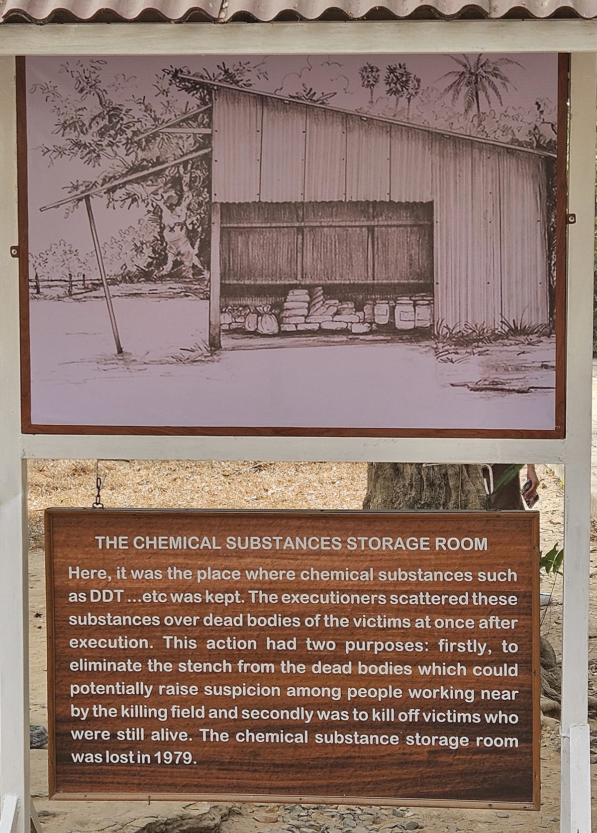 A sign explaining the chemical storage shed and the use of DDT.